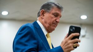 Joe Manchin questions Ken Paxton character in Senate race