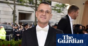 CFDA CEO Steven Kolb restrains PETA protesters at NYFW