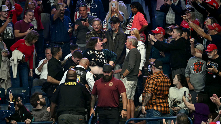 Trump rally heckler punched during Ohio event as crowd chants Trump rally heckler punched during Ohio event as crowd chants