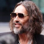 Prosecutor opens Russell Brand trial with predator claims Prosecutor opens Russell Brand trial with predator claims